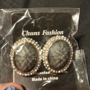 Green marbled stone and rhinestone accented stud earrings.